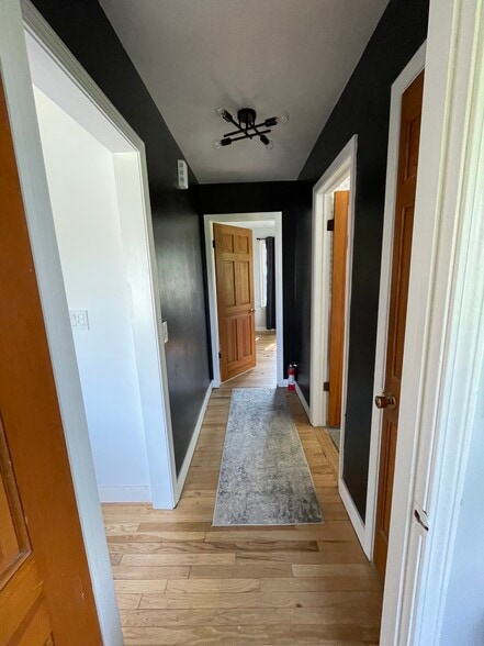 Hallway to Bathroom and 2 Main Bedrooms - 4148 S Pipestone Rd