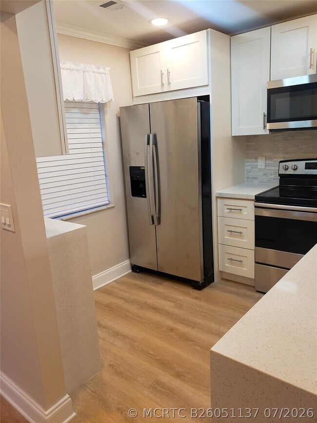 Building Photo - 7897 Golf Cir Dr