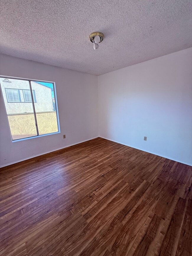 Building Photo - Long term Condo