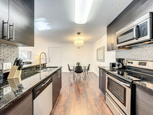 Building Photo - Pissarro Drive, Orlando, FL 32819 - 1 BR 1 BA condo