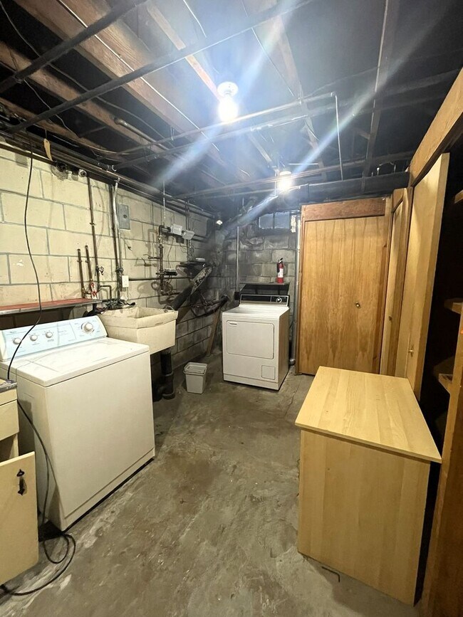 Building Photo - One Block to the Diag! Charming Home with Private Courtyard + Parking