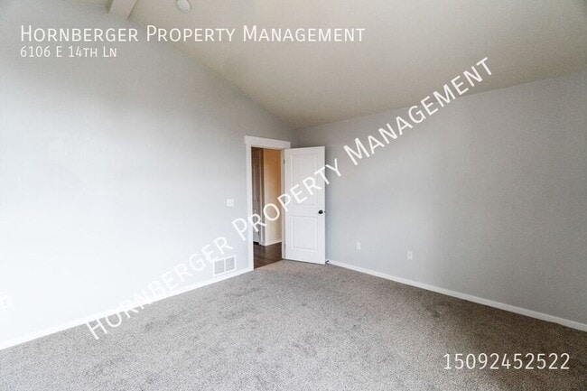 Building Photo - 6106 E 14th Ln