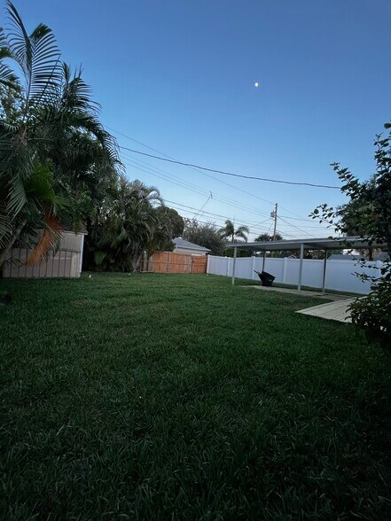 fence being replaced with vinyl all the way around on 7/28 - 3229 12th St N
