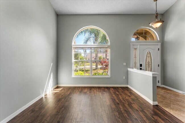 Building Photo - A vibrant 2-bedroom, 2-bathroom tropical retreat designed for both high-energy entertaining and l...