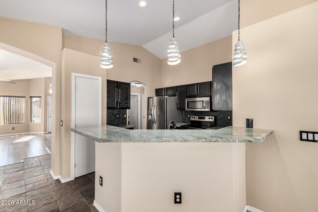 Building Photo - 8642 W Laurel Ln