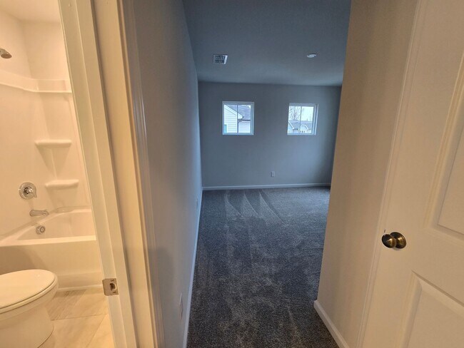 Building Photo - NEWLY BUILT END UNIT TOWNHOME