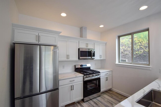 Building Photo - New South Hills Duplex Stunner!