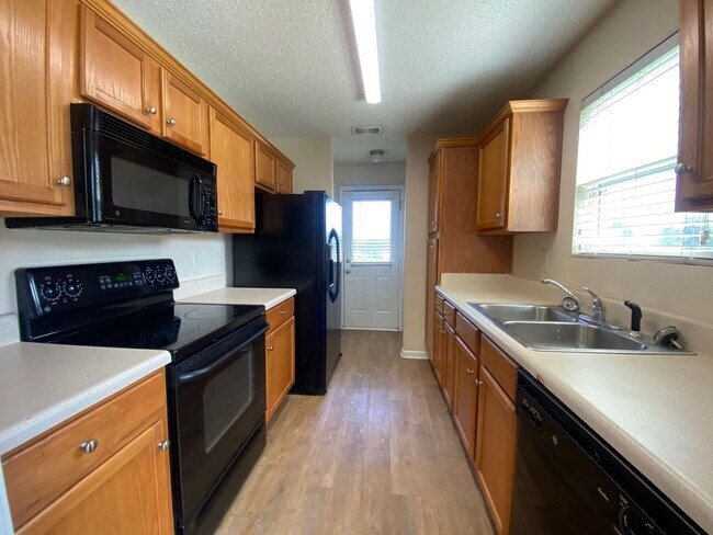 Building Photo - PRE-LEASING FOR AUGUST 2025!  1/2 OFF SECU...
