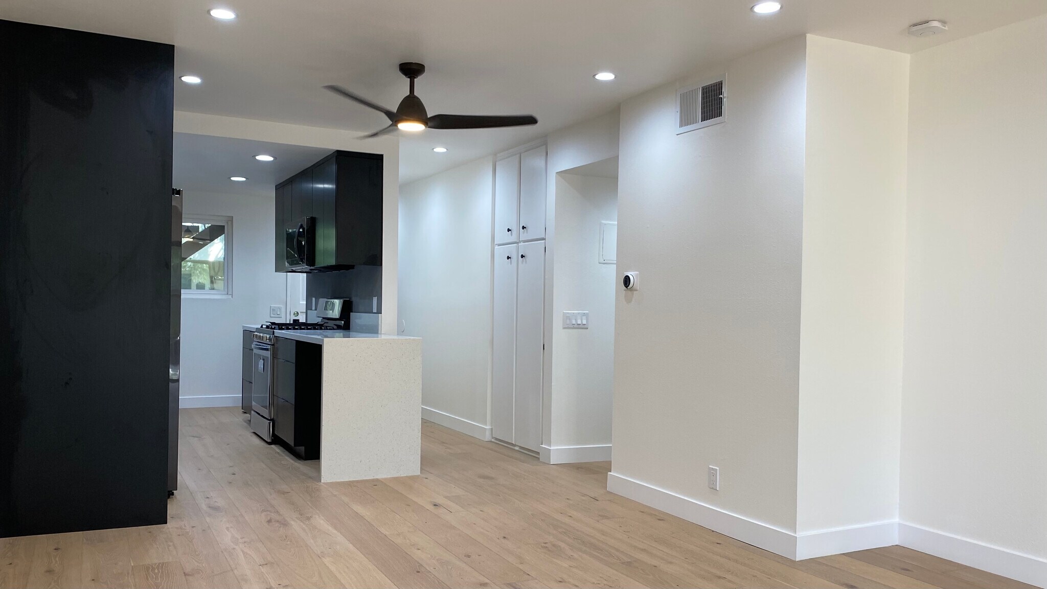 Dining / Living facing Kitchen and Hallway - 6474 Cavalleri Rd