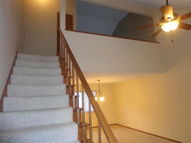 stairs to loft and bedroom - 6955 Dorr St