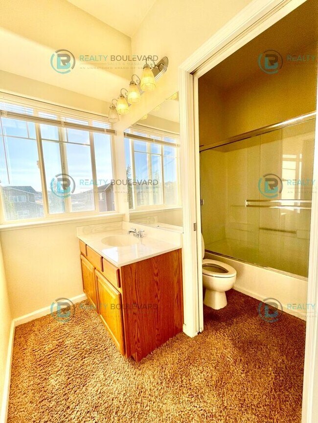 Building Photo - Stunning 3-Bedroom Townhome with Panoramic City Views, Upgraded Kitchen & Spacious Living in Nort...