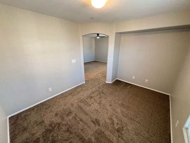 Building Photo - Spacious Tri-Level 4-Bedroom Home with Bal...