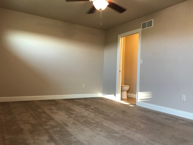 Master bedroom with master bath - 110 Scenic Dr