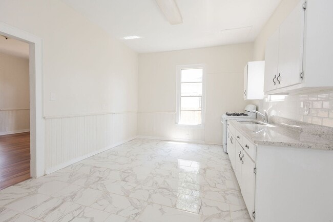 Building Photo - Move-In Special: Get 50% OFF Your First Month's Rent!