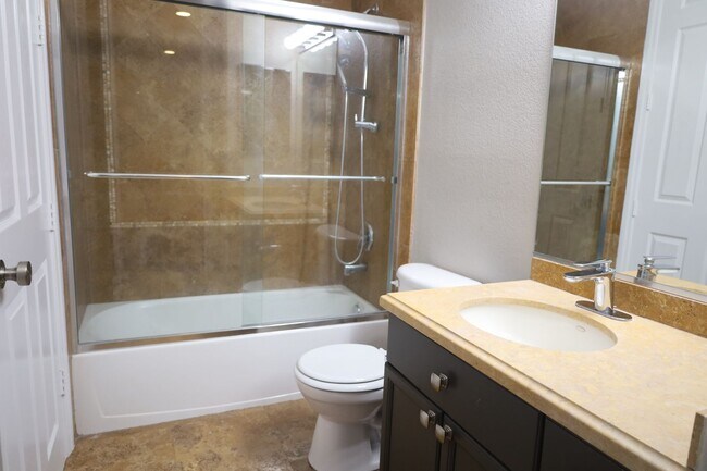 Building Photo - Fully Upgraded 5 Bedroom 4.5 Bathroom in Guard Gated Foothills Community!