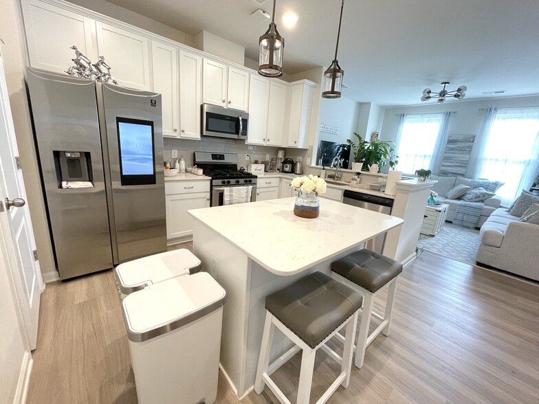 Kitchen with upgraded appliances - 9451 Avery Lilac Ln