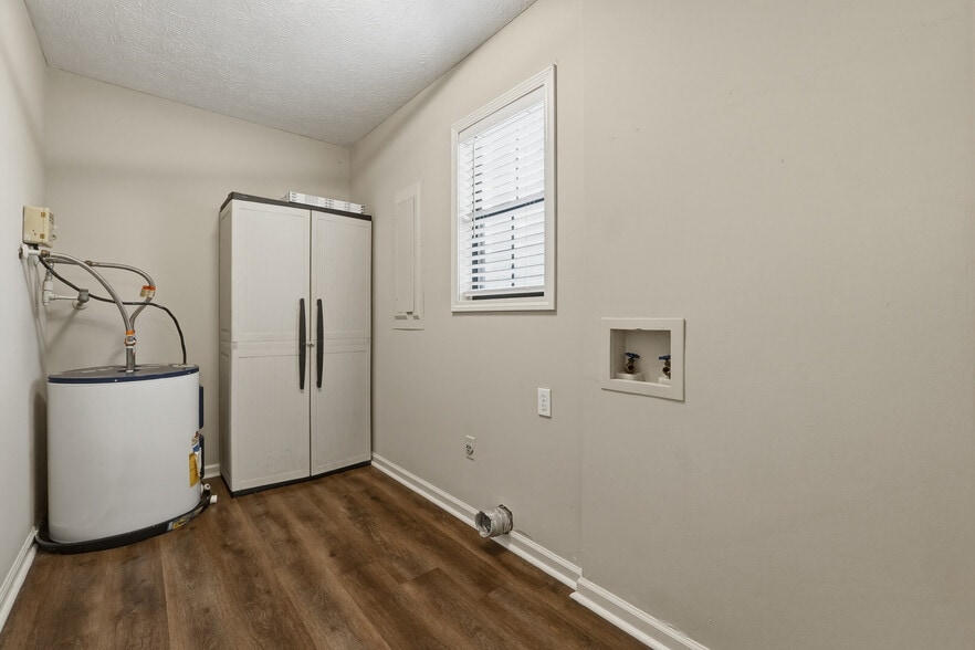 Laundry room with storage - 4357 Marjorie Road Southwest