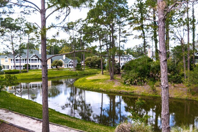 Building Photo - Spacious 3BR/3BA Ground-Floor Condo with W...