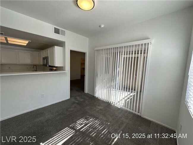 Building Photo - SPACIOUS FIRST-FLOOR CONDO LOCATED IN A GA...
