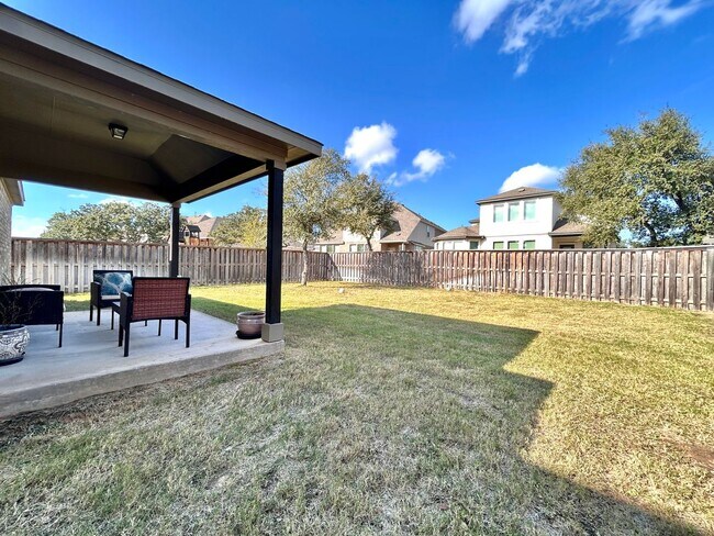 Building Photo - Inviting 4-Bed, 2.5-Bath Home with High Ceilings and Covered Deck