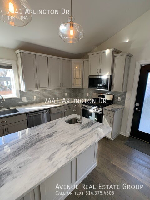 Building Photo - 7441 Arlington Dr