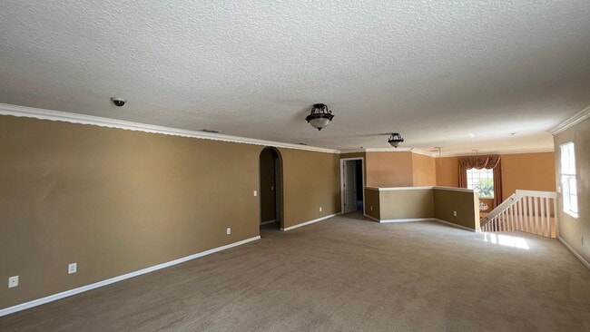 Building Photo - Spacious 4/3.5 Pool Home with Water View & 3-Car Garage in Lee Vista Area (close to Lake Nona)