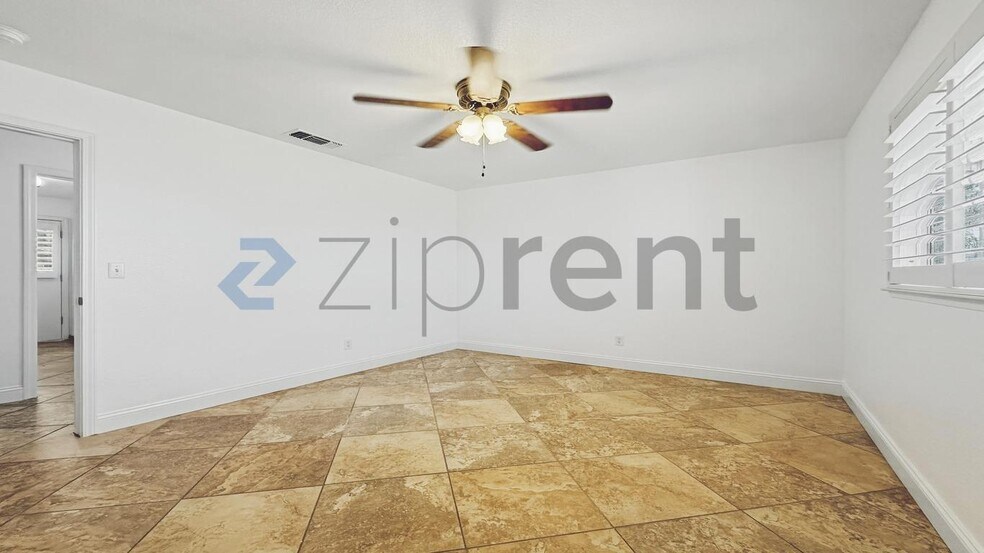 Building Photo - 8730 S East Ave