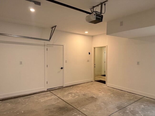 Building Photo - Vaulted Ceilings & Hardwood Floors in This Charming Indianapolis L