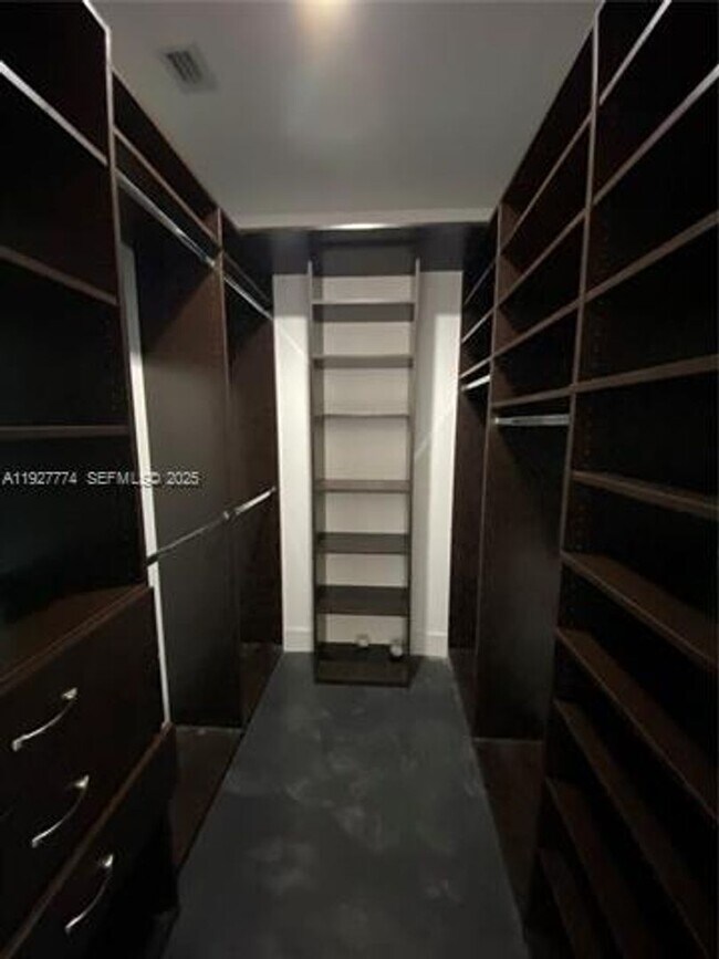 Building Photo - 7901 Hispanola Ave