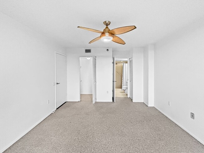 Building Photo - Feather Sound Condo for Rent – Unfurnished 1BR/1BA