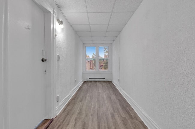 Building Photo - Spacious 5-Bed Renovated Home with Modern ...