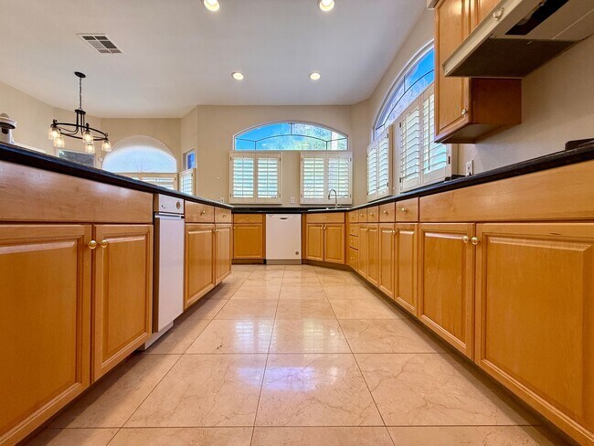 Building Photo - Grand 3 bedroom home with lake and golf course views located in Resort Villas ready to be your pa...