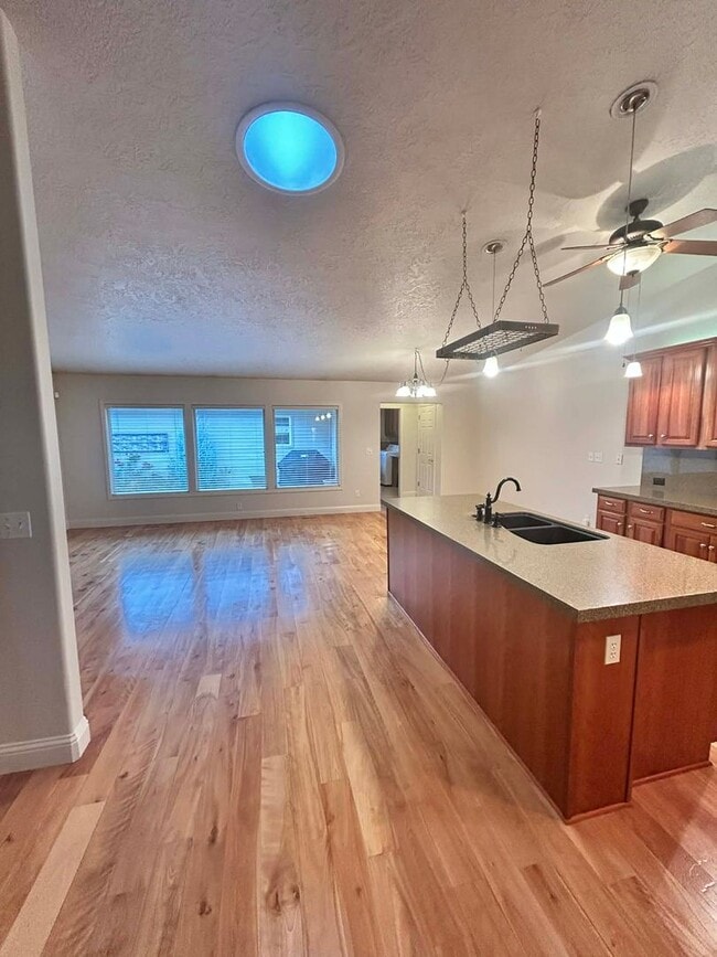 Building Photo - Spacious Duplex with 3-Car Garage & Private Patio!