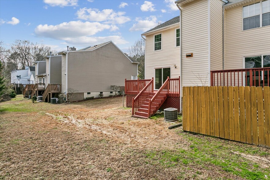 Spacious backdeck overlooks the backyard & common area - 5369 Gardner Ct