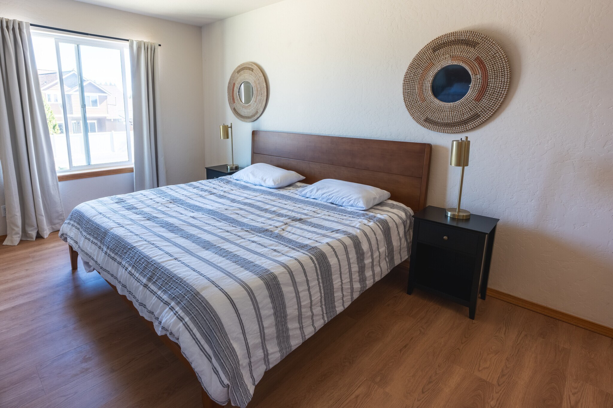 Main Bedroom - Spacious Walk in Closet with window. New KING memory foam mattress in 2026. View of C - 2805 W Dumont Dr