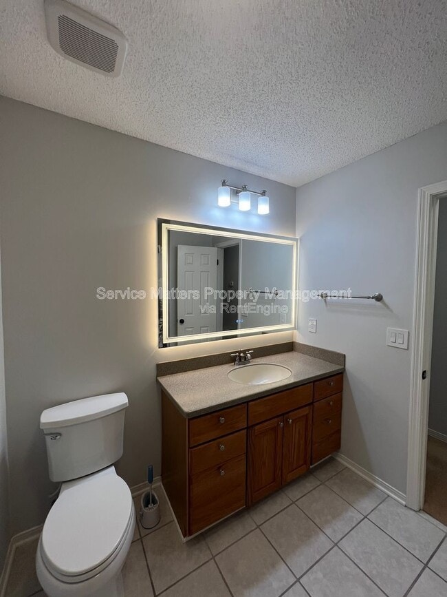 Building Photo - 6004 Players Pl