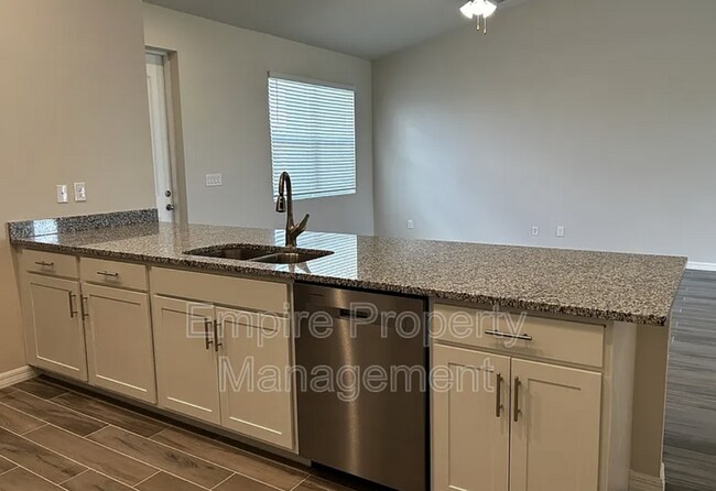 Building Photo - 4 Bedroom 2 bathroom 3 Car Garage NE Cape ...