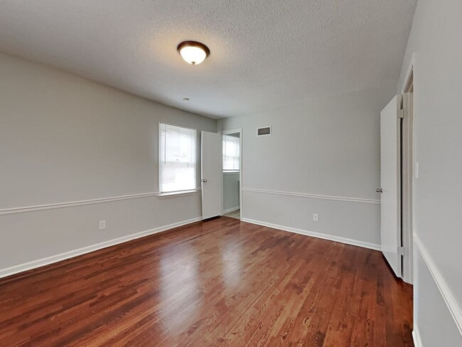 Building Photo - Spacious 4BR Home with Finished Basement, Fireplace & Unique Layout