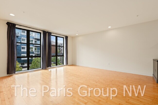 Building Photo - Exceptional 2 Story CapHill Condo * 2 Pkg Spaces, EV Charger & Rooftop Views