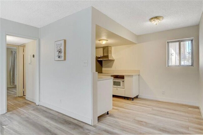 Building Photo - Completely Updated and Move-In Ready, 2 bedroom, 1 bath first floor unit!