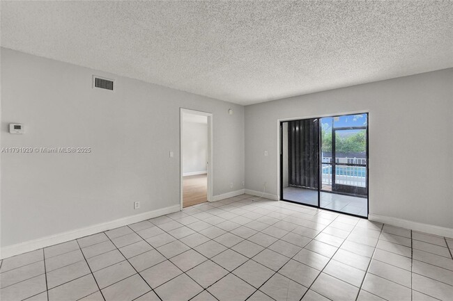 Building Photo - 3158 Coral Springs Dr