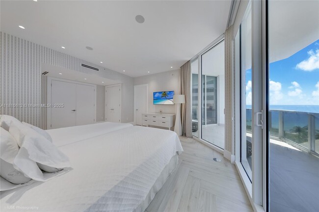 Building Photo - 10225 Collins Ave