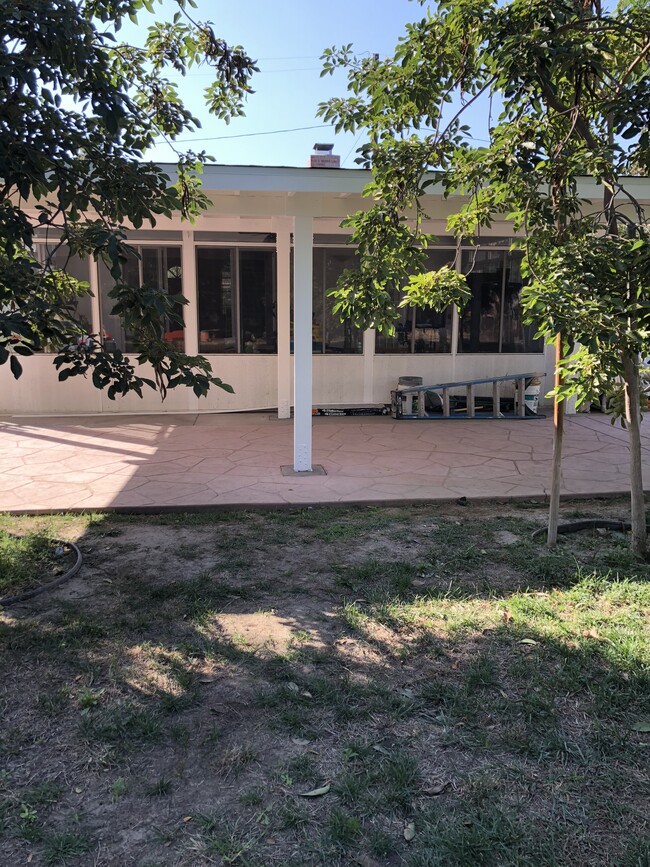 Backyard patio with pergola - 8440 Darby Ave