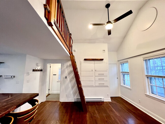 Open living space with natural lighting and built-in storage - 21 Washington St