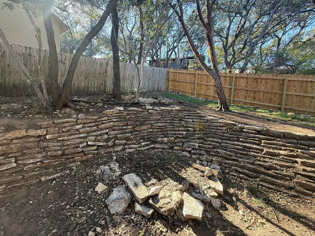 Building Photo - Wood Properties1 (8102 Dunn St)