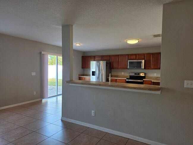 Building Photo - Four Bedroom Home at Waterford Trails in Orlando