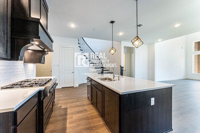 Building Photo - Highly Upgraded Five-Bedroom Home Located ...