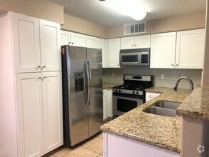 Building Photo - Thrive in this upgraded first-floor two be...
