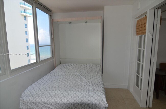 Building Photo - 5005 Collins Ave