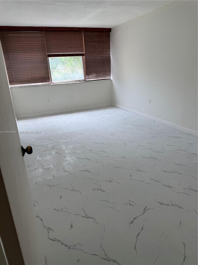 Building Photo - 6901 SW 147th Ave